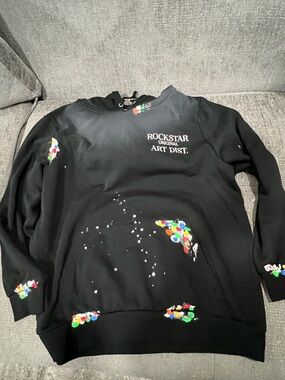 Rockstar Original Art Dist. Black Paint-Splash Hoodie. Q3